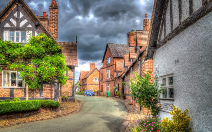 Street in Little Budworth, England with historic houses