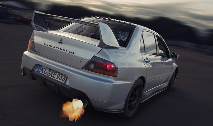 Mitsubishi Lancer Evolution VIII with flames from exhaust