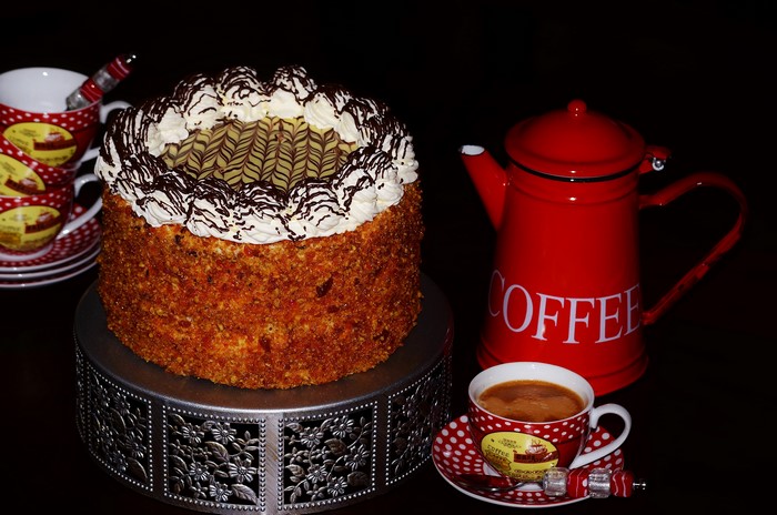 Cake with coffee and coffee pot