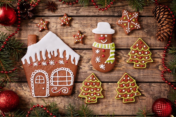 Christmas gingerbread cookies on wood planks