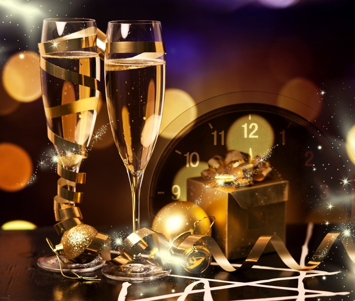 New Year's Eve Champagne Toast with Gifts and Clock
