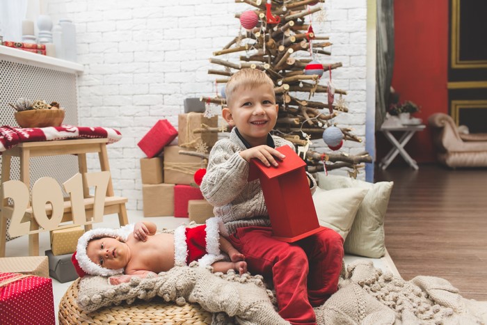 Boys and Infant in Christmas Setting with 2017 Decorations