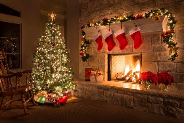 Christmas tree and fireplace with stockings