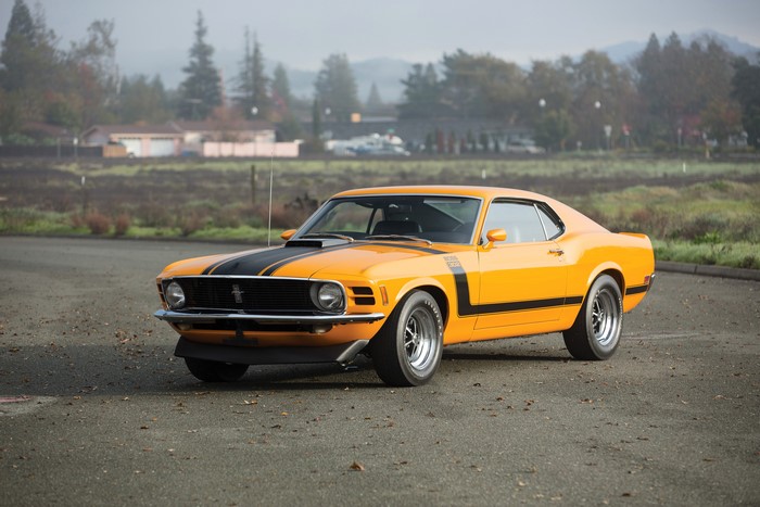 1970 Ford Mustang Boss 302 in yellow with black stripes