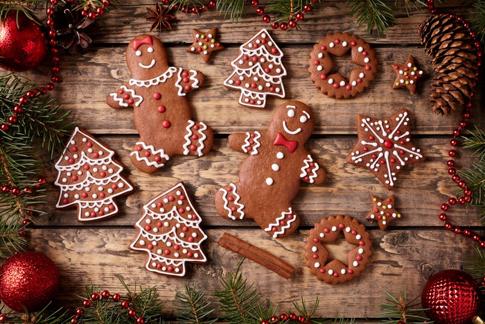 Christmas gingerbread cookies on wooden planks
