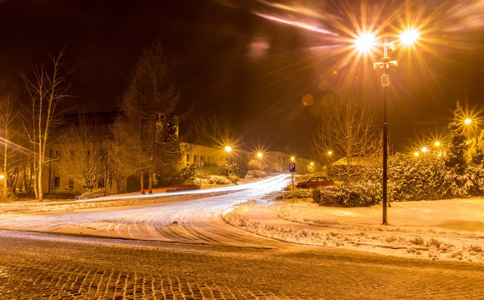 Winter night in Czech Republic with snow and street lights