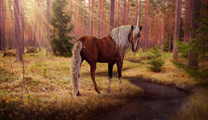 Unicorn standing by a stream in a sunlit forest