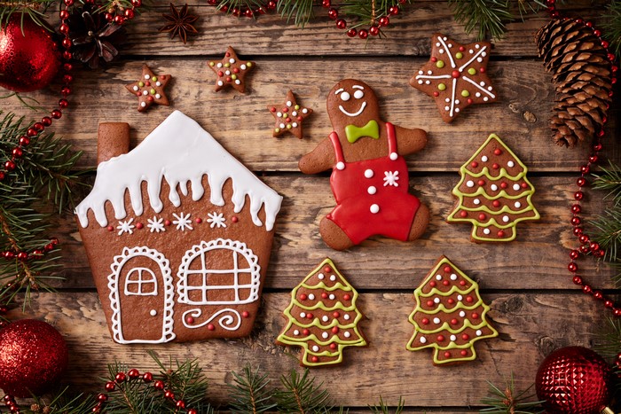 Christmas gingerbread cookies on wood planks