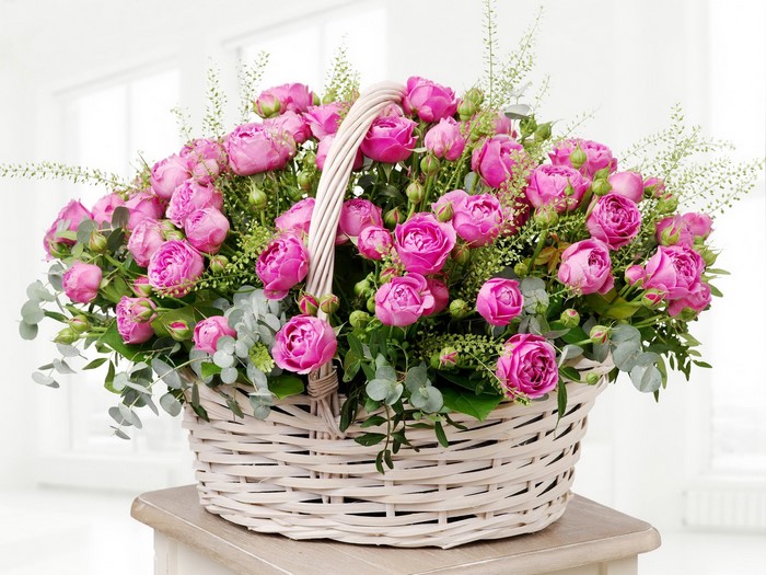 Pink roses in a wicker basket