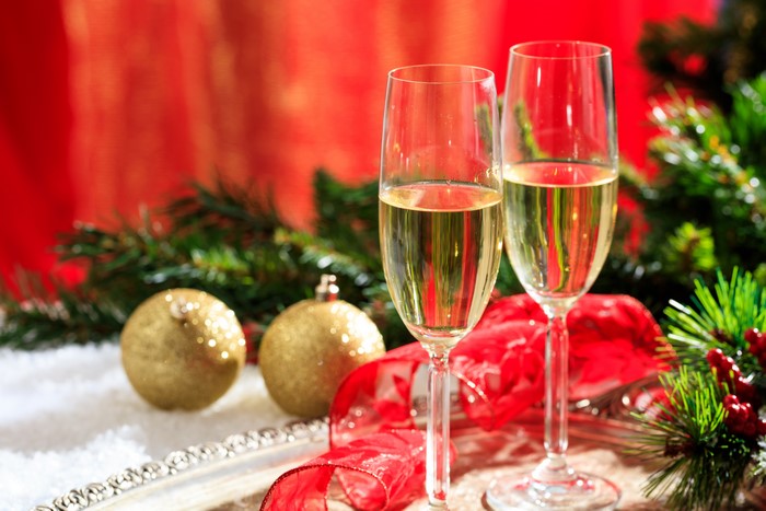 Champagne glasses with Christmas decorations