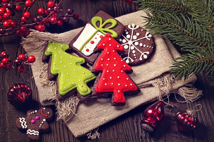 Christmas Cookies with Berries and Pine Branch