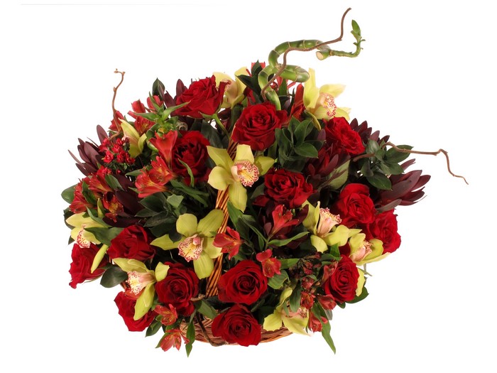Red roses and orchids in a basket