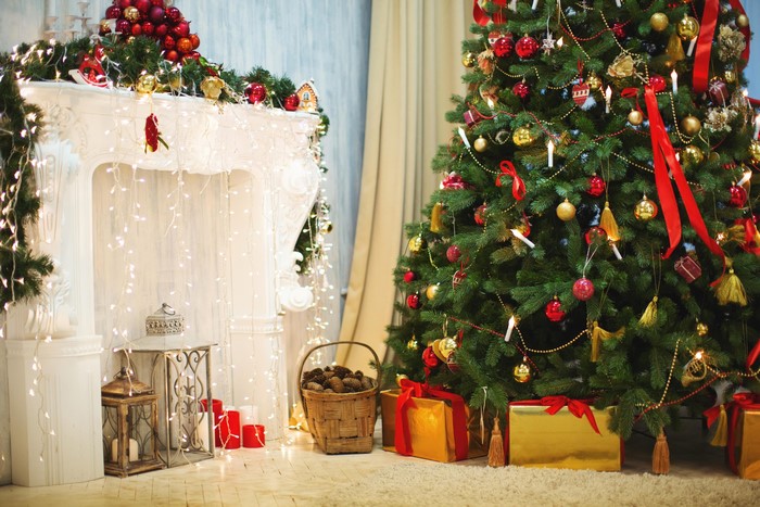 Christmas tree and fireplace with gifts