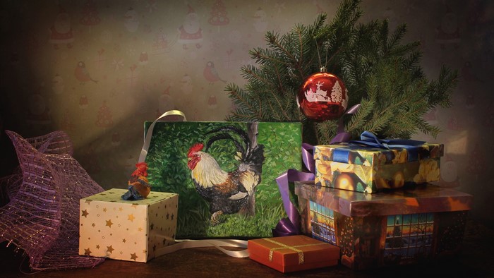 Christmas gifts and a painting of a rooster