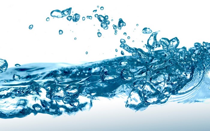 Water surface with bubbles and splashes