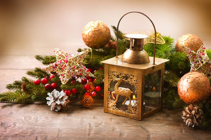 Christmas lantern with ornaments and pine cones