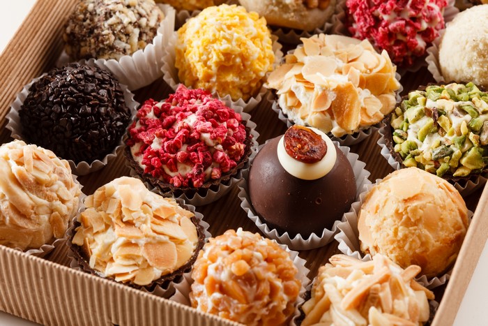 Assortment of gourmet chocolates and candies in a box