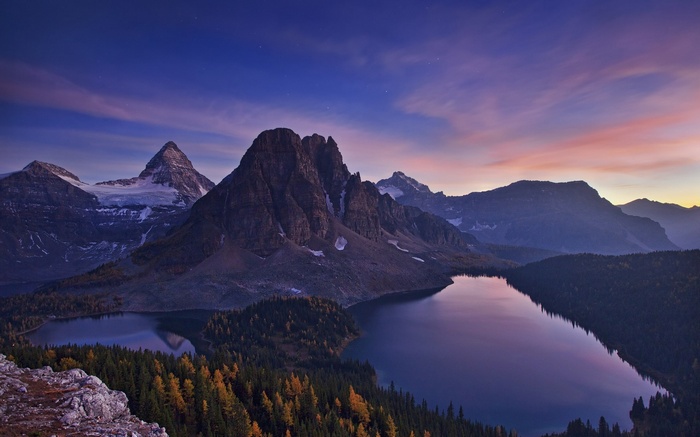 Mountain lake at twilight with colorful sky