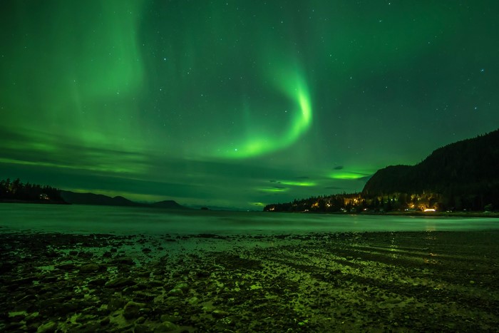 Aurora Borealis over Alaskan Coastline at Night