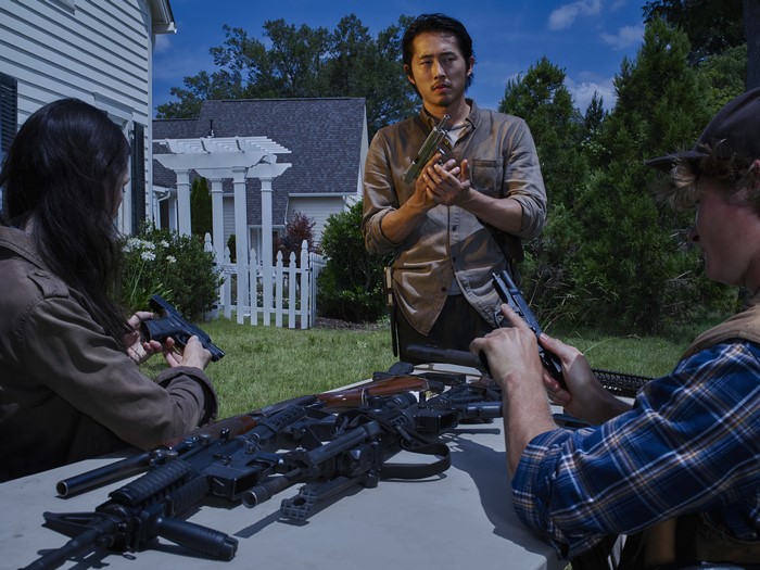 Glenn from The Walking Dead with pistols