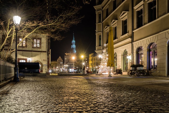 Zwickau street at night with Christmas tree and street lights