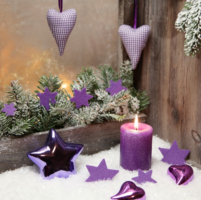 Christmas decoration with candle and stars