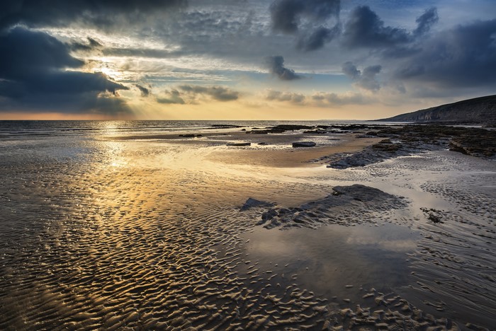 Dunraven Bay, Wales Coastline at Sunset with Dramatic Clouds