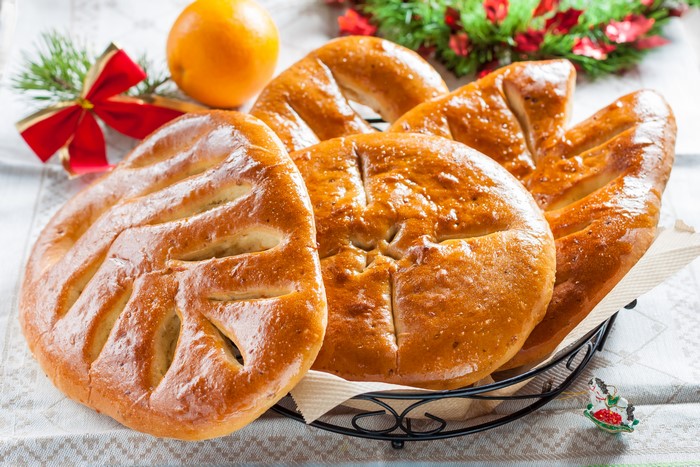 Christmas pastries with orange and pine branches