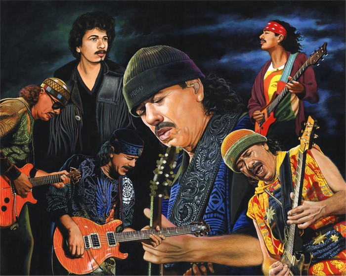 Carlos Santana and band playing guitars