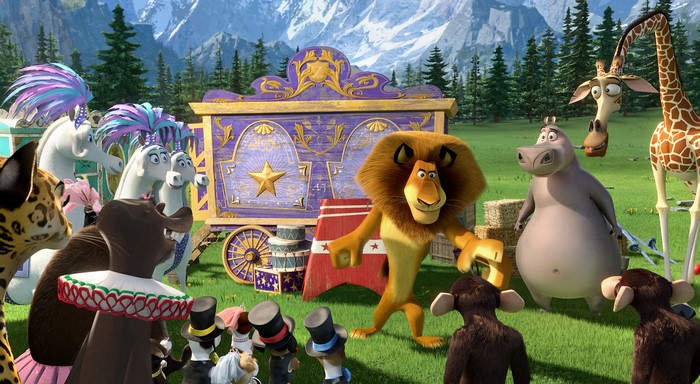 Alex the Lion and circus animals with a circus wagon