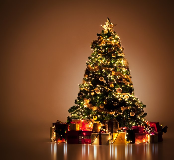 Christmas tree with gifts and fairy lights
