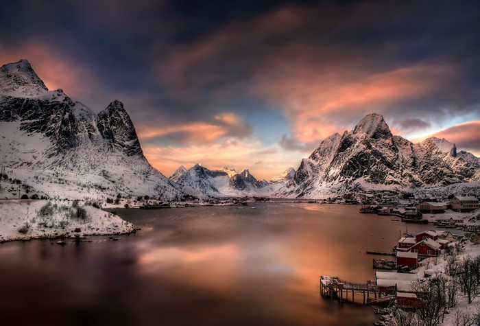 Snowy Lofoten Mountains and Village at Sunset