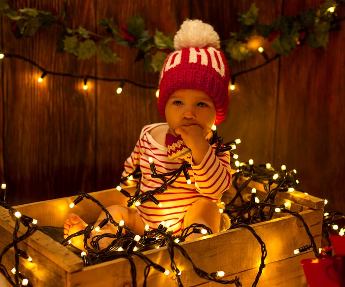 Baby in Christmas Hat and Lights
