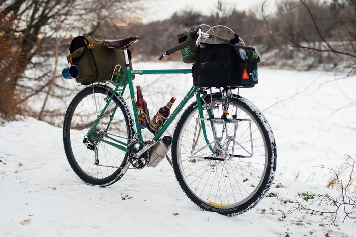 Bicycle with beer bottles in the snow