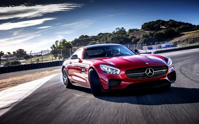 Red Mercedes-Benz AMG on a Race Track