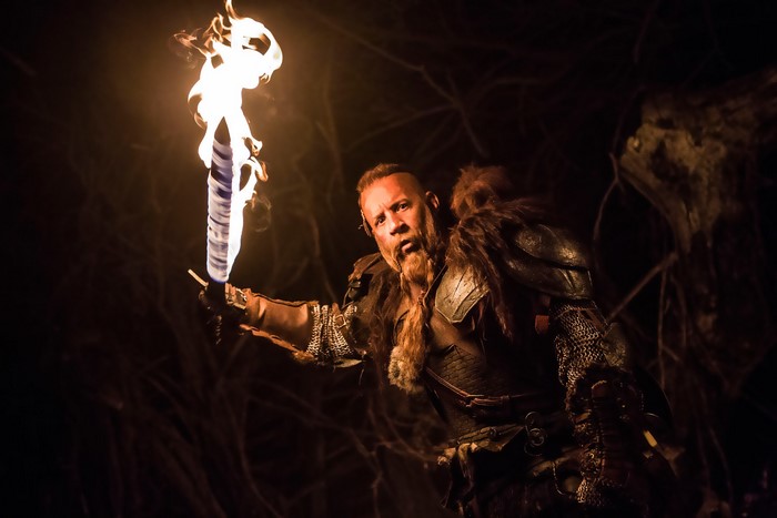 Kaulder from The Last Witch Hunter holding a flaming sword