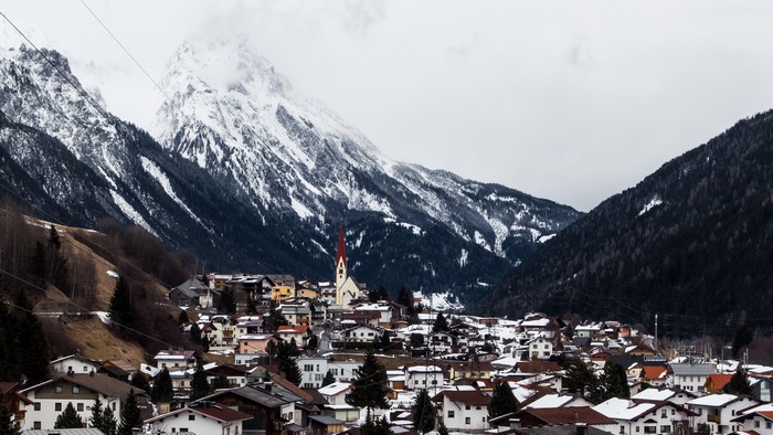 Village nestled in snowy Austrian Alps
