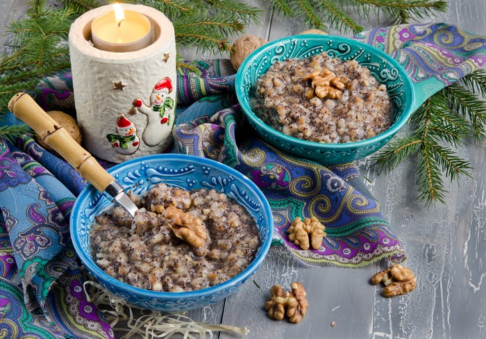 Kutia Russian Christmas with candle and walnuts
