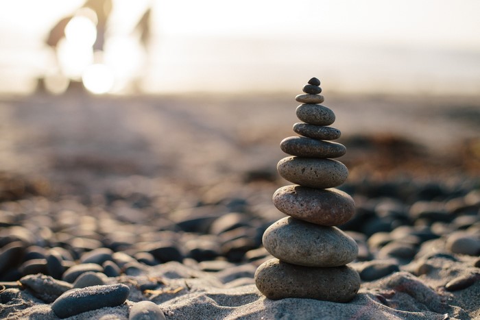Stack of balanced stones on a beach