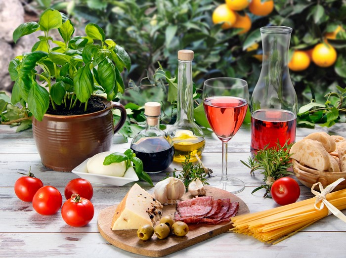 Italian Food Spread with Wine and Oranges