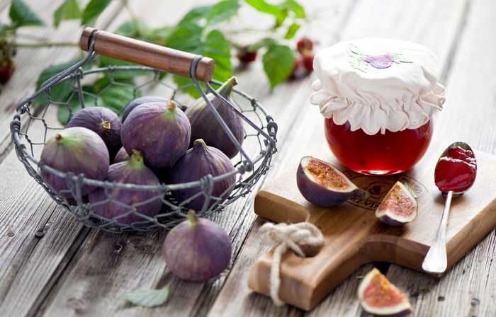 Figs and Jam in a Wicker Basket