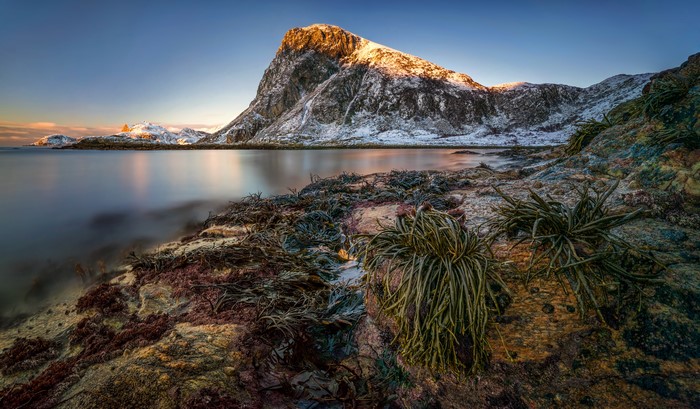 Snowy Mountains and Coastline in Lofoten, Norway