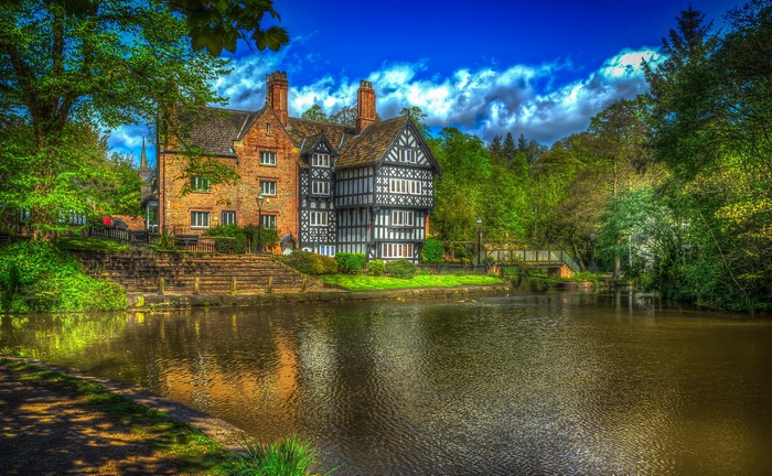 Tudor style house by a river in Salford, Greater Manchester, UK