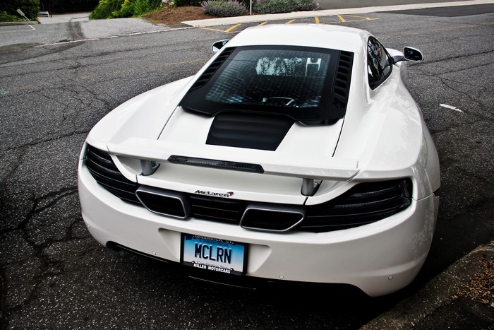 White McLaren 12C parked on asphalt