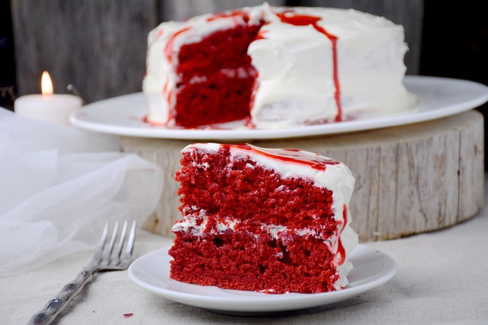 Red Velvet Cake Slice with White Frosting