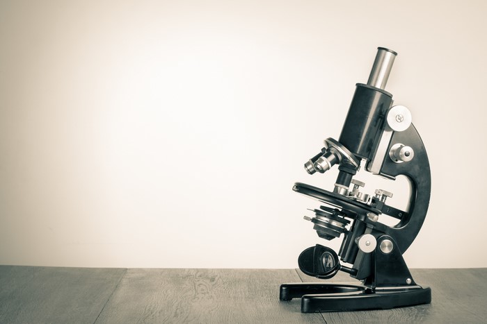 Microscope on a wooden table