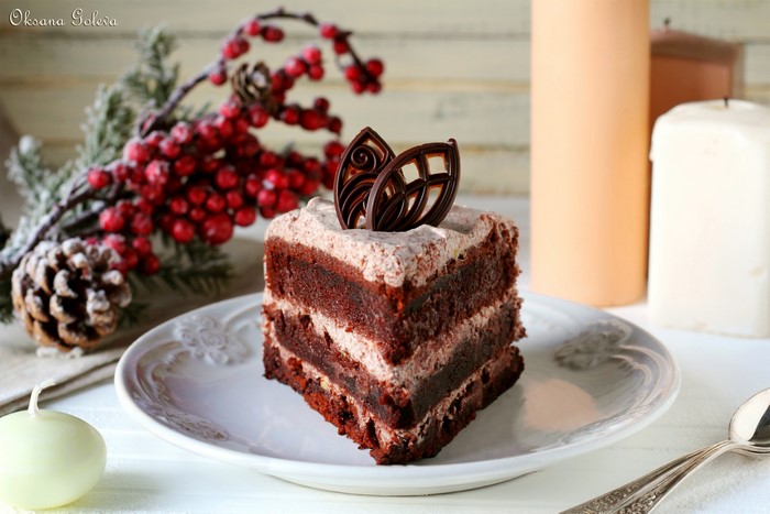 Slice of chocolate cake with chocolate decorations