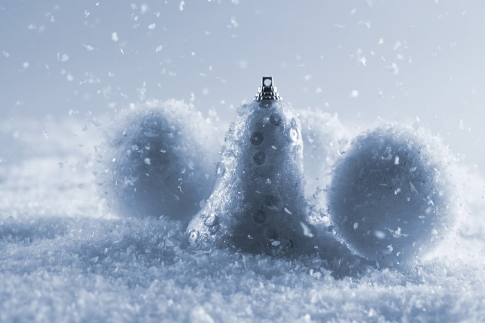 Christmas bell and balls in snow