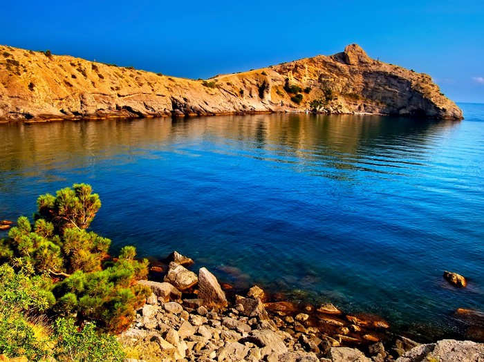 Rocky coast and blue sea in Crimea, Russia