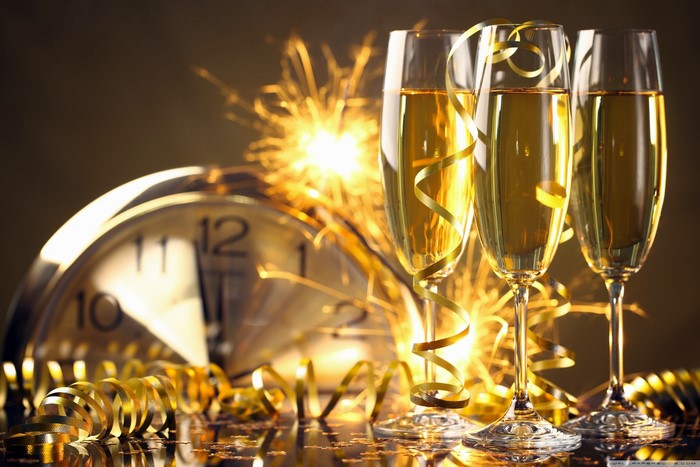 Champagne Glasses with Sparklers and Clock